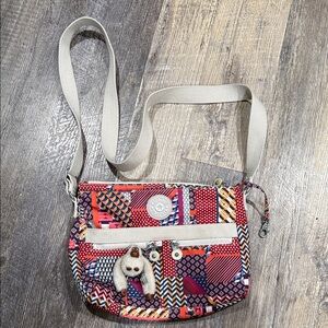Kipling Multicolor Geometric Patch Crossbody with Cream Strap and Monkey Charm